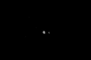 Plutón y Caronte, en julio 2014, justo antes de la última hibernación de New Horizons. Créditos: NASA.